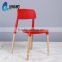 LS-4006 Hot selling cheap elegant design wood legs plastic stacking chair
