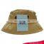 custom wide brim beige color fashing hat flat top with 2 metal eyelets cotton safari bucket hat