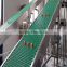 Pom material climbing belt conveyor system for packing industry