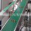 Pom material climbing belt conveyor system for packing industry