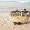 Seagrass beach bag with seashell decoration, cool design for summer holiday