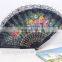 Spanish style plastic folding fan with flower