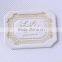 White jeans leather label