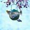 Hanging humming bird feeder