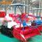 Factory price mini rice paddy cutting machine / rice harvest machine / price of rice harvester