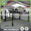 Low cost four post lift car parking system