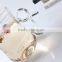 china wholesale high quality hand made clear glass drinking mug/cup with unique shape handle& infuser for elegant lady