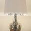 Finland chrome base bedside table lamp with electroplate lampstand and off-white barrel shade