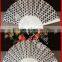 Plastic hand fan with dot design