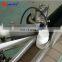 Labeling machine for amber glass bottles, plastics and other materials