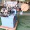 US3000D automatic apparel T shirt weaving label cutting and folding machine with end centre middle triangle fold