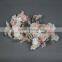 Artificial colourful cherry blossom garland for window display