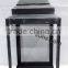 metal garden lantern with glass and rope handle
