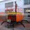 movable hydraulic scissor lift/four wheels mobile scissor electric lift platform / hydraulic aerial work platform