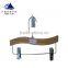Wooden pants hanger with metal clamp