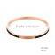Rose gold plated with black enamel stainless steel bangle with engrave logo
