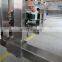 Automatic Premade Pouch Double Filling Sealing Packing Machine for Granule and Liquid with Vacuum Conveyor