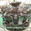 Automatic 500g 1kg coffee beans quad seal pouch weighing and packing machine