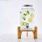 Large-Cap Glass Dispenser with Spigot! Thick glass, sleek spigot for easy pour. Holds drinks, fruit design—ideal for parties.