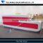 White high glossy jewellery shop red&white reception counter design
