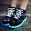 Stock lot led light bettery charge casual lace-up couples shoes nightclub