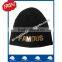 100% acrylic soft beanie hat with fashion metal letter trims attached on cuff wholesale factory  china