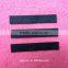 straight cut black background black logo woven label