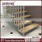 floating outdoor metal stair railing with wood treads