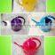 yellow and pink watering can