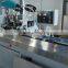 Semi-automatic book saddle stitching machine