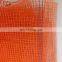 orange building construction scaffold safety net
