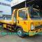 HOWO 3800mm wheelbase cheap wrecker tow truck, L5600*W2300 flatbed wrecker towing truck on sale in Africa