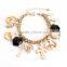 multiple charms cross peace bracelet