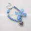 Wholesale blue fabric stainless steel chains bowknot design heart pendant necklace set for Oktoberfest                        
                                                                                Supplier's Choice