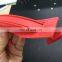 Red plastic handle for carton packing