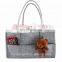 diaper caddy with shoulder belt trim leather pocket edge