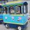 Funfair rides fiberglass battery operated electric trackless tourist train for kids to ride for sale