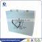 white paper bag with logo print
