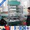 Rubber tile press with moulds