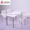 White panel steel bracket dining table