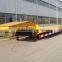 Low loader / low bed truck trailer used to transport crawl equipment