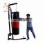 Four boxers punching sandbags for power training