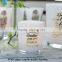 unique candle jars sprayed white or black glass candle jar printed with gold logo made in China