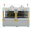 Double-station hot riveting machine for automotive door panels