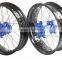 Motorcycle wheels:KTM Supermoto wheelsets: orange hubs with black rims 3.50-17" and 5.00-17"