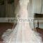 Style ZS-a0050 Trumpet strapless organza faced bodice tulle wedding dress with floral detail