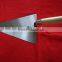 Triangle bricklaying trowel with wooden handle