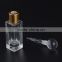 Promotional gifts square shaped mini glass bottle with aluminum cap and glass stick for cosmetic perfume packaging