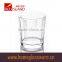 300ml clear glass cup with small bubbles at the bottom and embossed letter for drinking