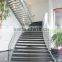 Helical Stairs with Stone Treads arc double spine steel staircase glass balustrade
